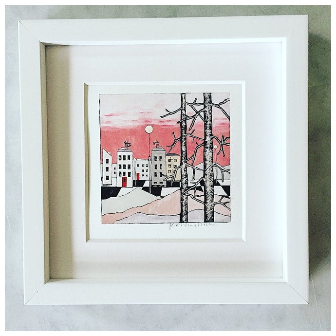 Stad med rosa himmel